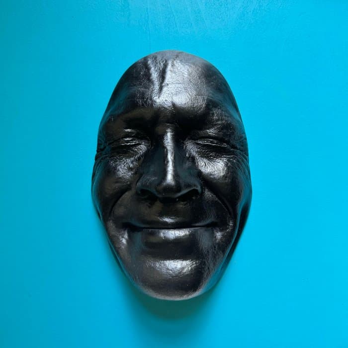 Gregos (1972) - Black smile on blue light background